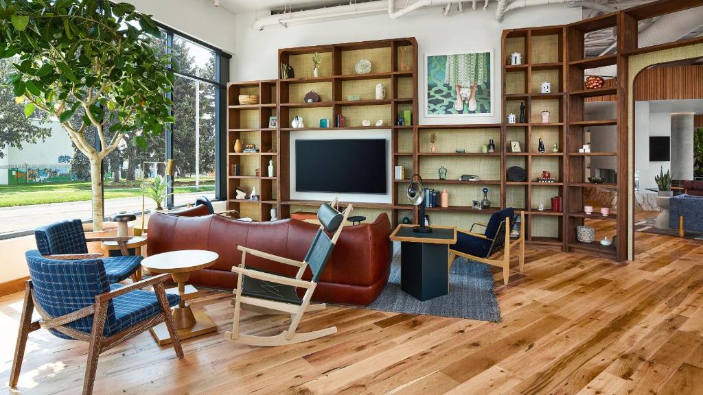 Catbird Hotel lounge with sofa and armchairs
