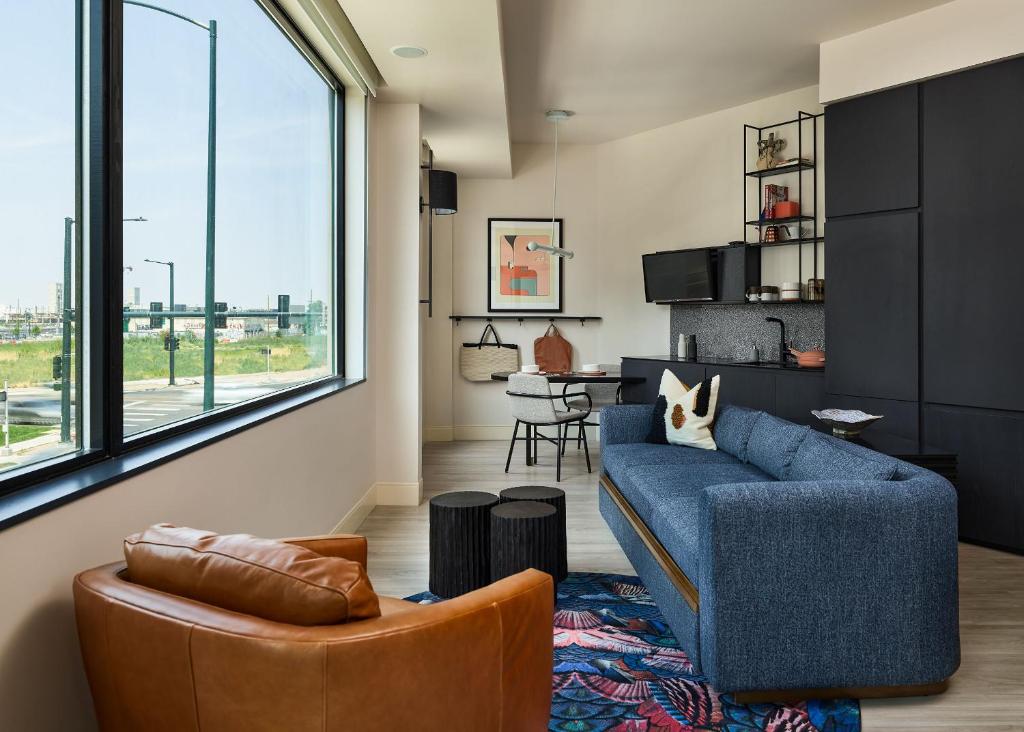 Catbird Hotel blue sofa opposite the window