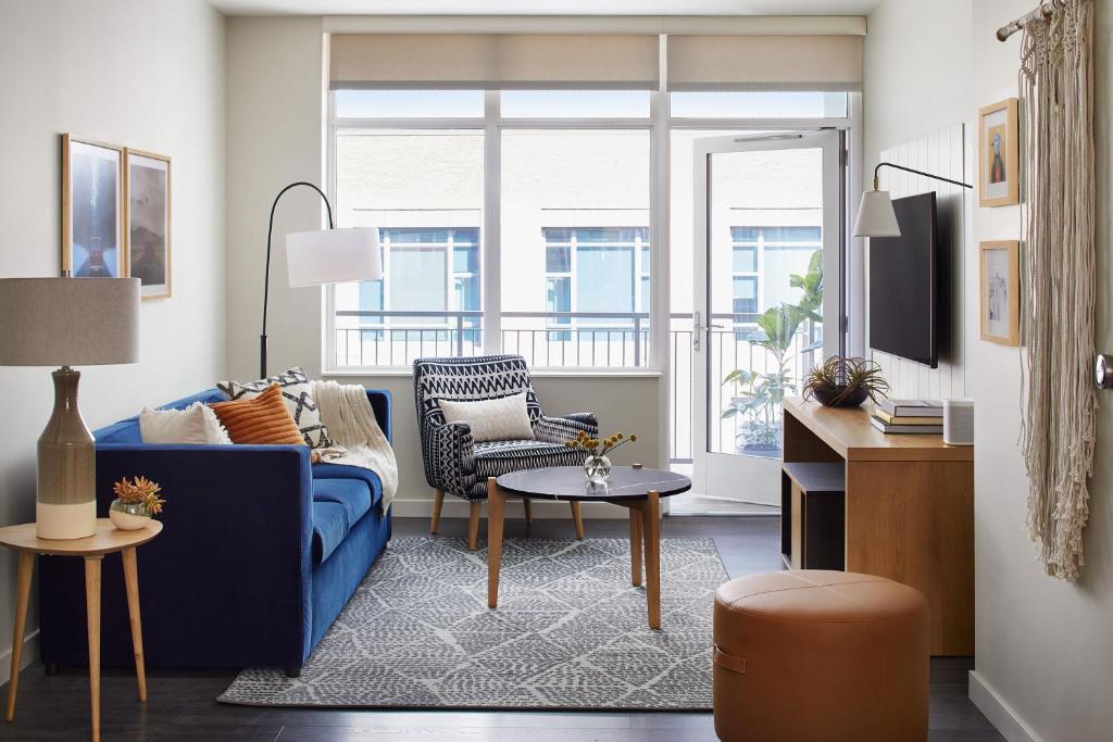 Sentral Union room with sofa and armchair